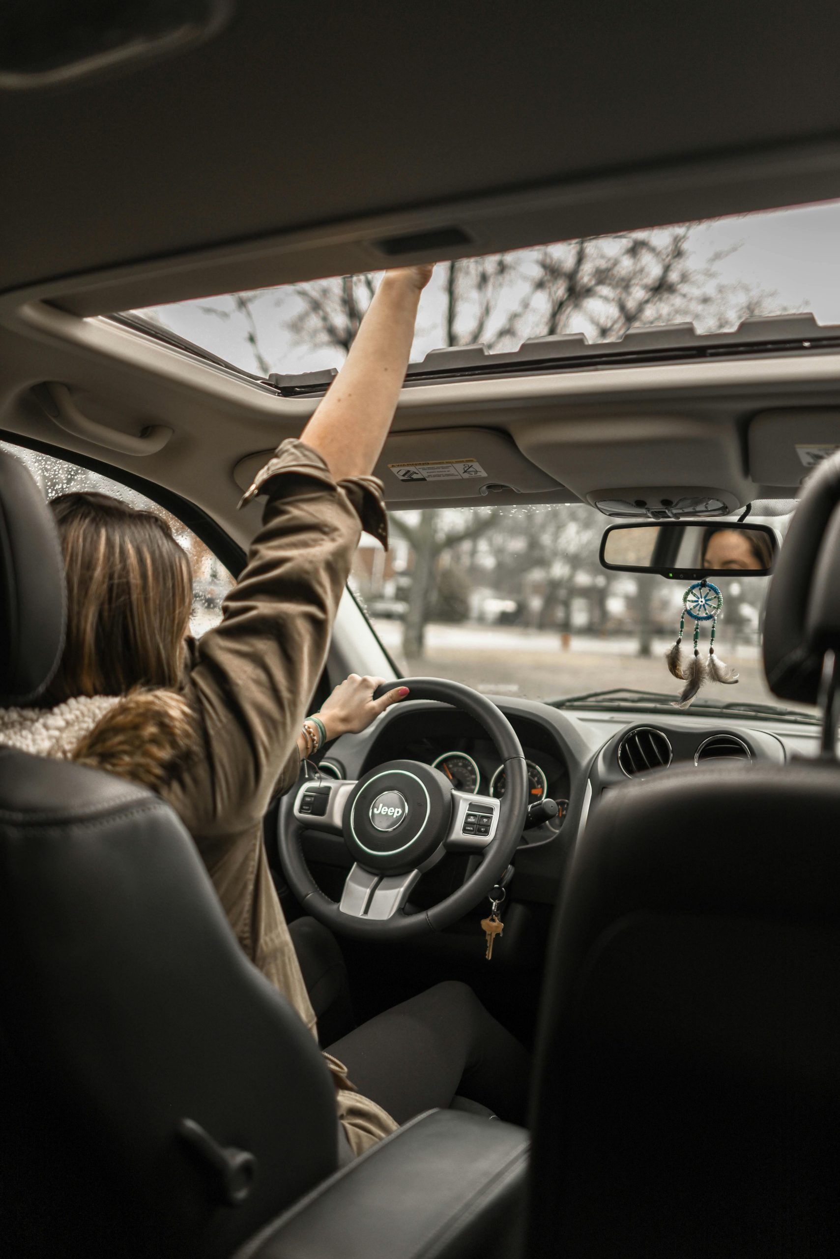 Woman Driving a Car